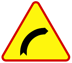 Znak drogowy A-1: niebezpieczny zakrt w lewo.